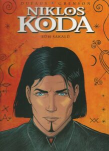 NIKLOS KODA – BŮH ŠAKALŮ